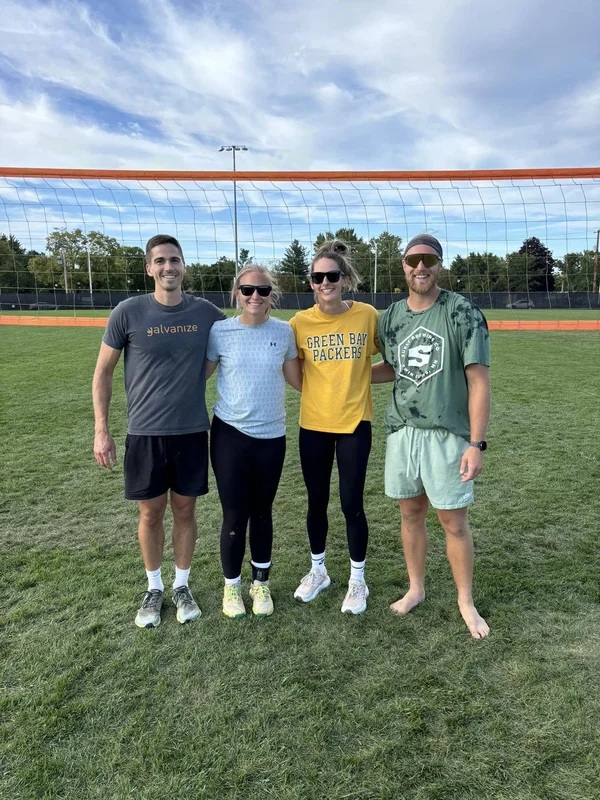 Kyle with volleyball team at UWL Grass Smash